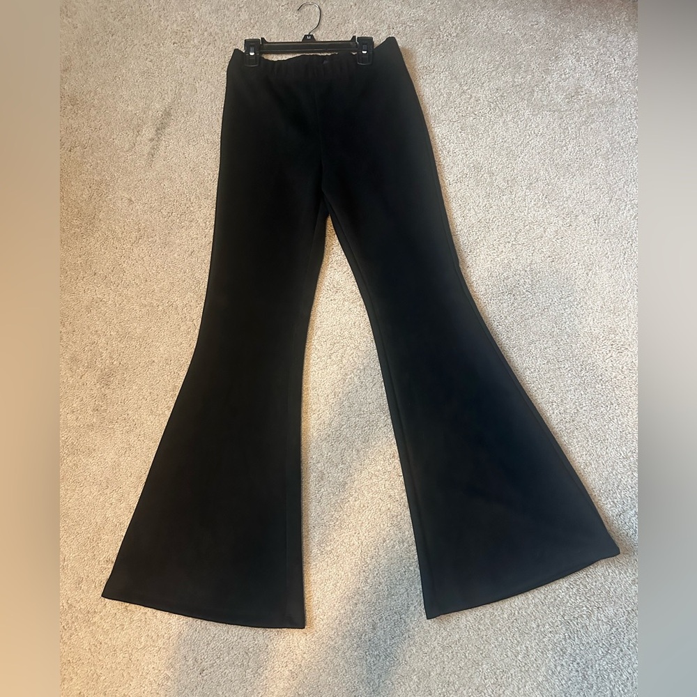 H&M, velour black flares!  Size M